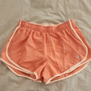 Nike Orange Athletic Shorts with Curved Hem